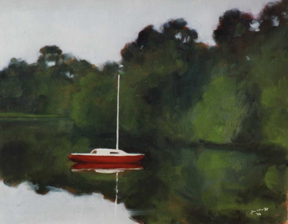 Boat in a wooded lake (58K)